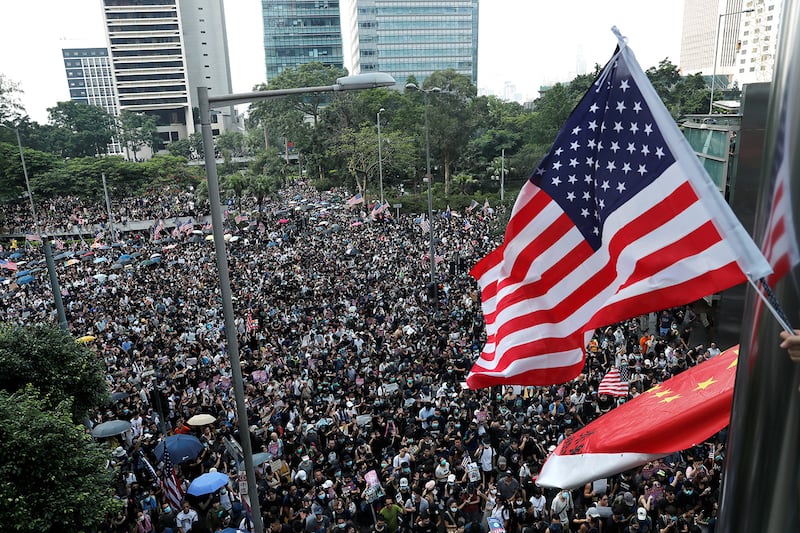 Protesters march to call for the passing of the Hong Kong Human Rights and Democracy Act by the U.S. Congress, in Hong Kong, Sept. 8, 2019.