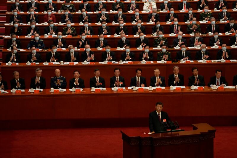 Delegates applaud as Chinese President Xi Jinping speaks during the opening ceremony of the 20th National Congress of China's ruling Communist Party held at the Great Hall of the People in Beijing, China, Oct. 16, 2022. Credit: AP