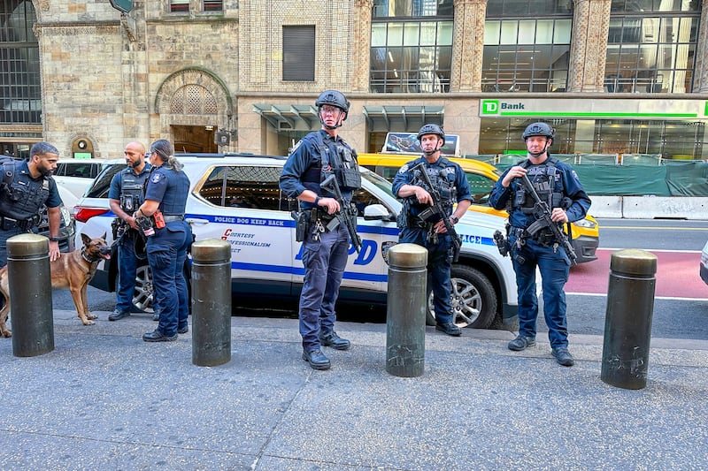 Police officers in New York on Wednesday, September 11, 2024, stand along 42nd Street in Manhattan, a main road used by visiting diplomats when traveling to and from the United Nations headquarters. (Ted Shaffrey/AP)